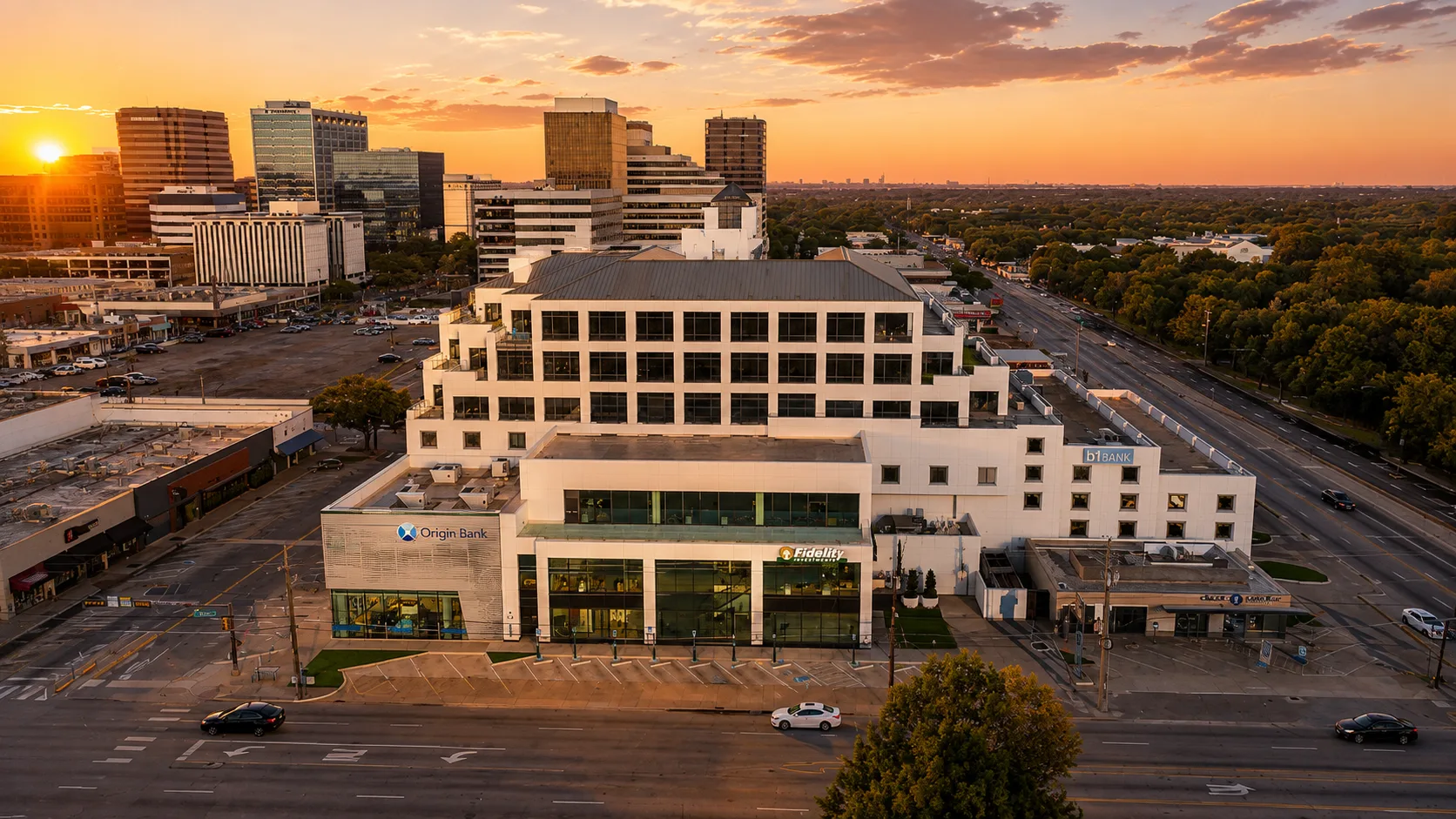 Preston Financial Center at golden hour, viewed from Northwest Highway